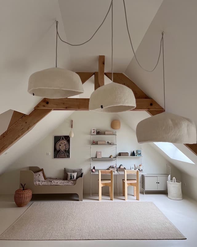 Chambre d’enfant rénovée avec élégance par DC Concept Rénovation – ambiance épurée, murs en béton ciré et mobilier naturel, collection 2025.